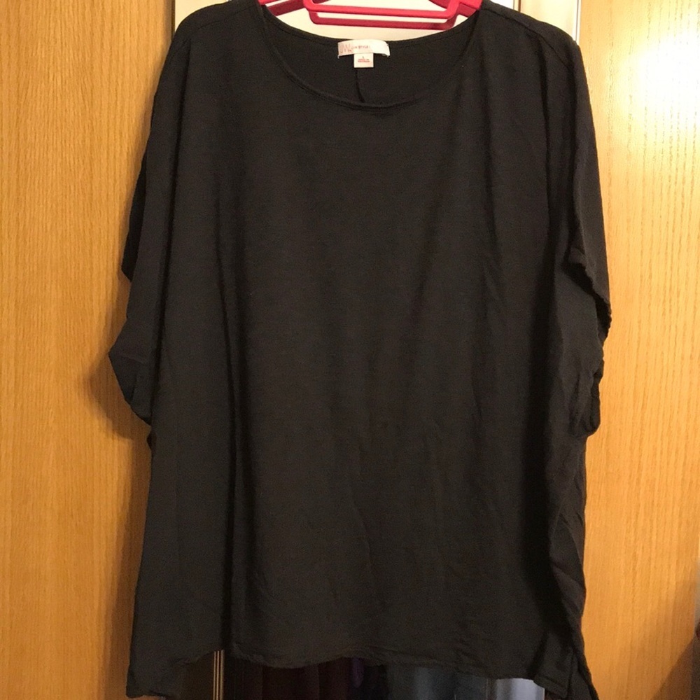 JW Style Size Large (oversized) round neck, short sleeves, black tee shirt